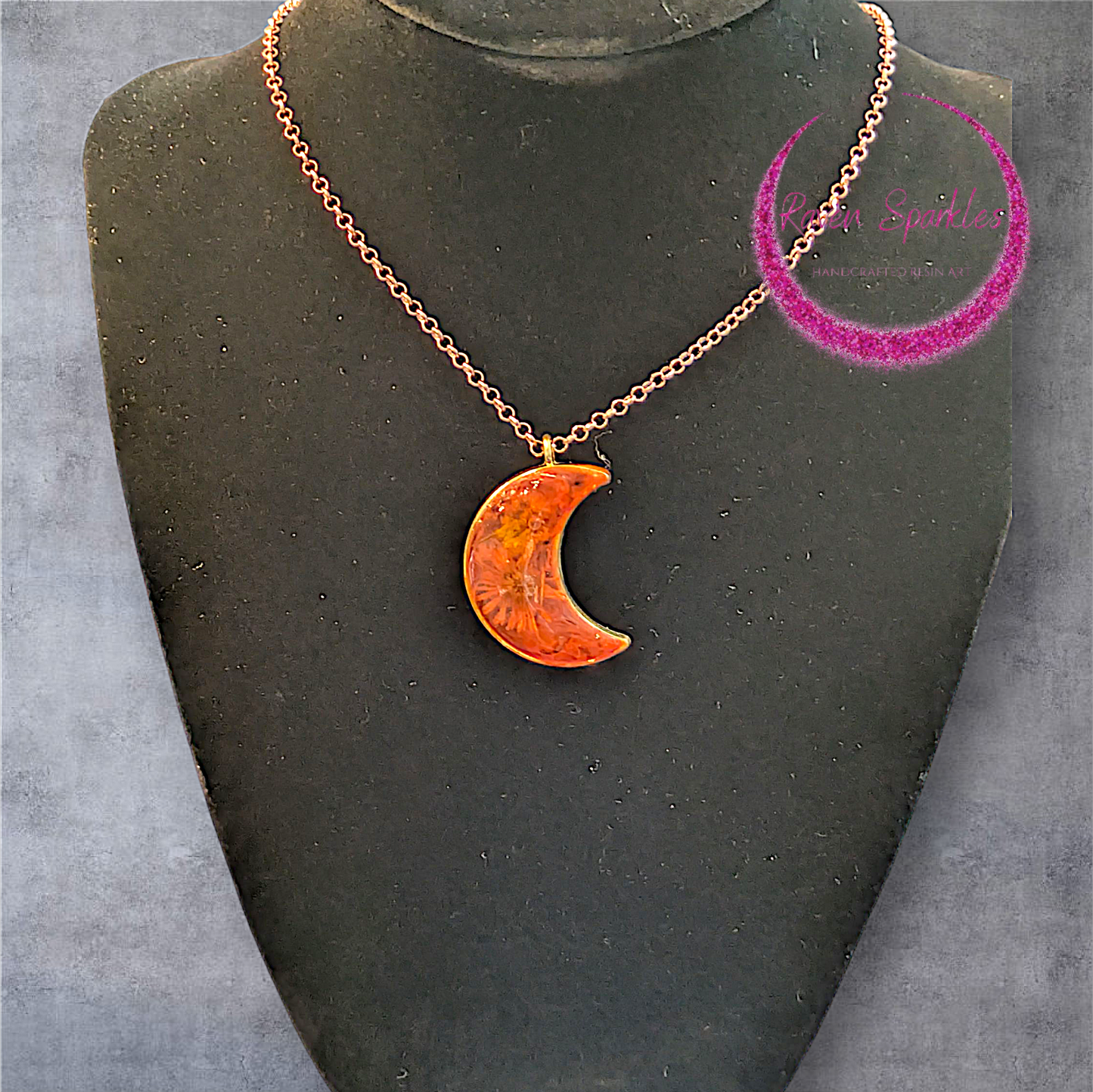 Orange flower moon pendant